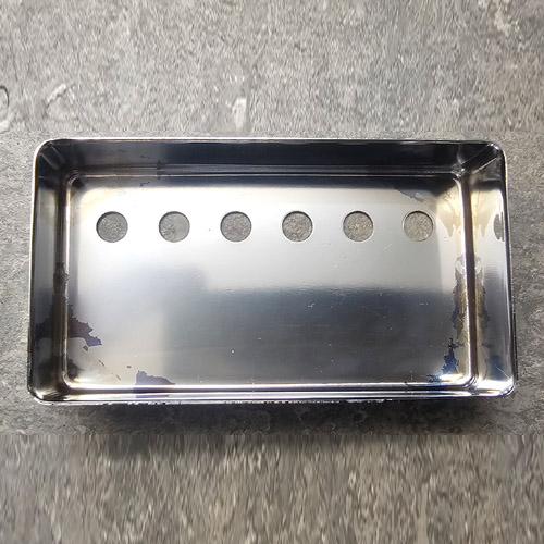 Inside a humbucker cover